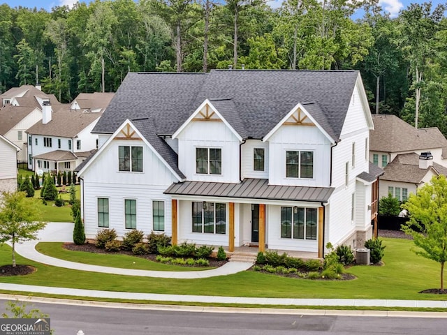 6080 Simone St, Acworth, GA 30101 - modern inspired farmhouse with a shingled roof, board and batten siding, a porch, and a standing seam roof