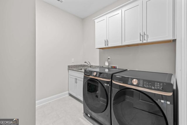 6080 Simone St, Acworth, GA 30101 - washroom featuring washer and dryer and cabinet space