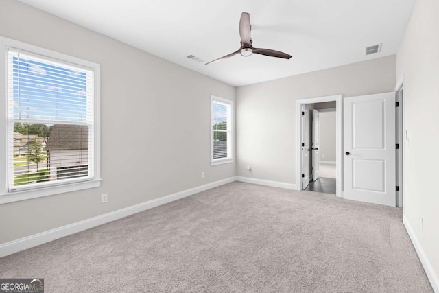 6080 Simone St, Acworth, GA 30101 - unfurnished bedroom featuring carpet flooring and a ceiling fan