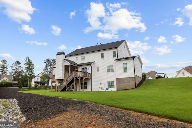 6080 Simone St, Acworth, GA 30101 - back of property featuring stairway, a lawn, a wooden deck, and a chimney
