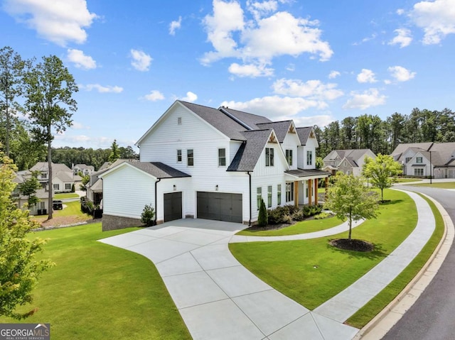 6080 Simone St, Acworth, GA 30101 - view of front facade featuring an attached garage, a residential view, a front yard, concrete driveway, and roof with shingles