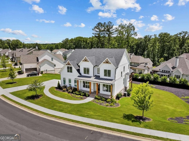 6080 Simone St, Acworth, GA 30101 - modern farmhouse with board and batten siding, a residential view, a standing seam roof, a porch, and a shingled roof