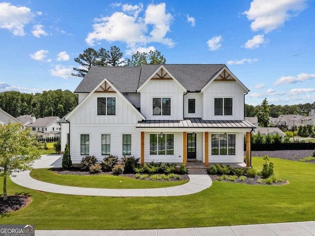 6080 Simone St, Acworth, GA 30101 - modern inspired farmhouse with board and batten siding, a standing seam roof, covered porch, and roof with shingles