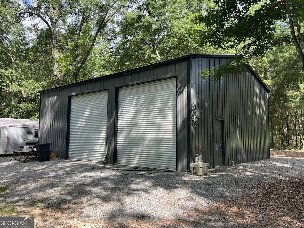 1030 Marley Cannon Rd, Dublin, GA 31021 - detached garage featuring view of scattered trees