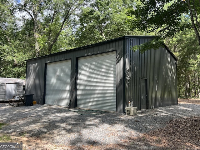 1030 Marley Cannon Rd, Dublin, GA 31021 - detached garage featuring view of scattered trees