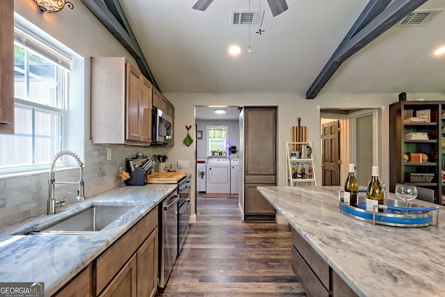 11 Hamilton Cir, Blairsville, GA 30512 - kitchen with independent washer and dryer, dark wood-style floors, appliances with stainless steel finishes, backsplash, and light stone counters