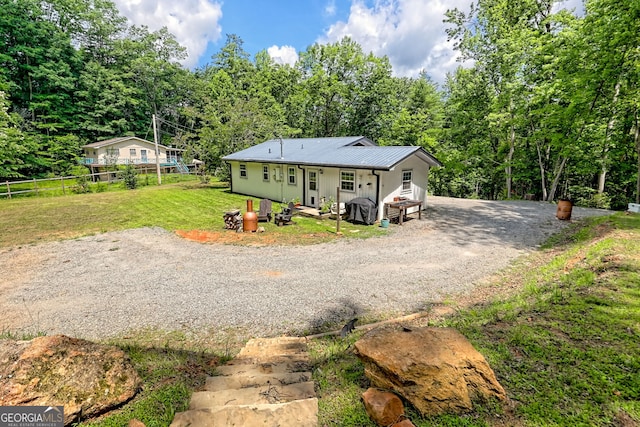 11 Hamilton Cir, Blairsville, GA 30512 - view of front of home featuring gravel driveway and a metal roof