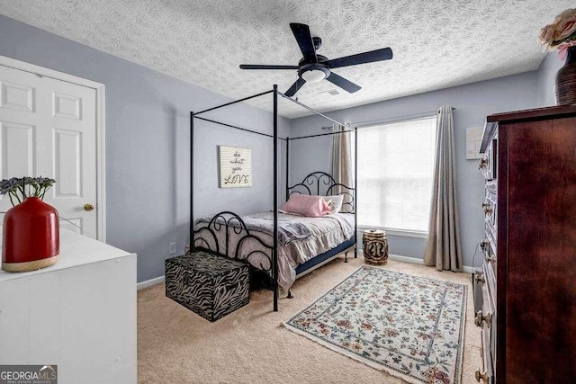 15 Saddlebrook Ct, Covington, GA 30016 - bedroom with carpet floors, a textured ceiling, and ceiling fan