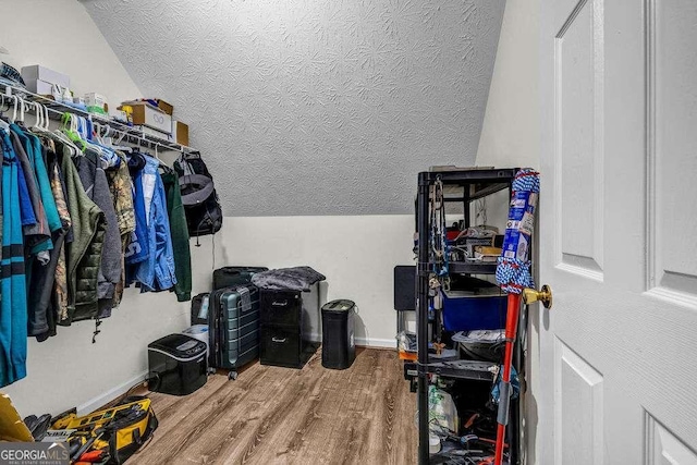 15 Saddlebrook Ct, Covington, GA 30016 - spacious closet with wood finished floors and lofted ceiling
