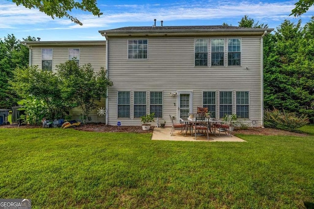 15 Saddlebrook Ct, Covington, GA 30016 - back of house with a patio and a yard