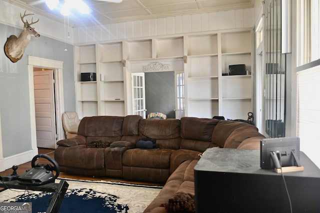 5321 Oak St, Eastman, GA 31023 - living area with plenty of natural light, ceiling fan, wood finished floors, and built in features