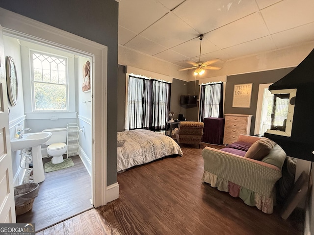 5321 Oak St, Eastman, GA 31023 - bedroom with dark wood finished floors and ensuite bathroom