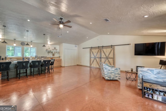 1529 Cedar Vw, Hiawassee, GA 30546 - living room with vaulted ceiling, finished concrete floors, ceiling fan, and a textured ceiling