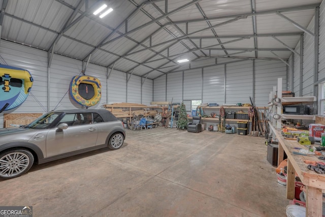 1529 Cedar Vw, Hiawassee, GA 30546 - garage featuring metal wall and a workshop area