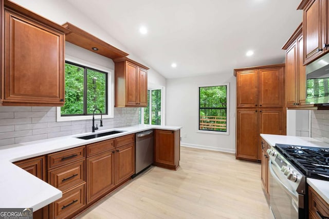 3292 Holly Mill Ct, Marietta, GA 30062 - kitchen featuring appliances with stainless steel finishes, tasteful backsplash, light countertops, and recessed lighting