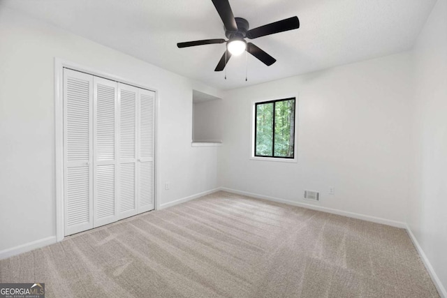 3292 Holly Mill Ct, Marietta, GA 30062 - unfurnished bedroom with carpet, a closet, and ceiling fan