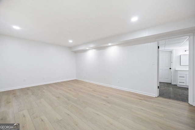 3292 Holly Mill Ct, Marietta, GA 30062 - finished below grade area featuring light wood finished floors and recessed lighting