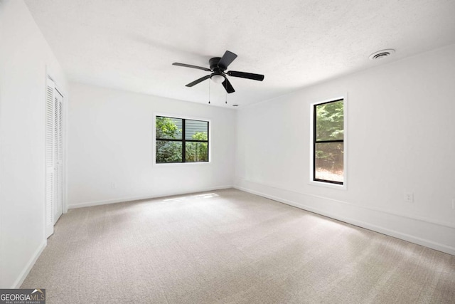 3292 Holly Mill Ct, Marietta, GA 30062 - unfurnished room featuring plenty of natural light, carpet, and a ceiling fan