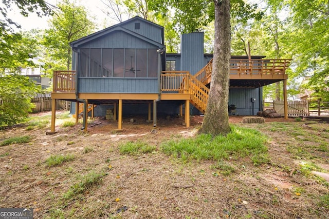 3292 Holly Mill Ct, Marietta, GA 30062 - rear view of house featuring stairway, a wooden deck, and a sunroom