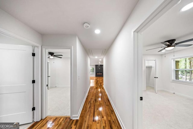 2798 Hutchins Rd, Lawrenceville, GA 30044 - corridor with attic access, wood finished floors, and recessed lighting