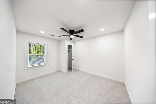 2798 Hutchins Rd, Lawrenceville, GA 30044 - unfurnished bedroom featuring light colored carpet, recessed lighting, and a ceiling fan
