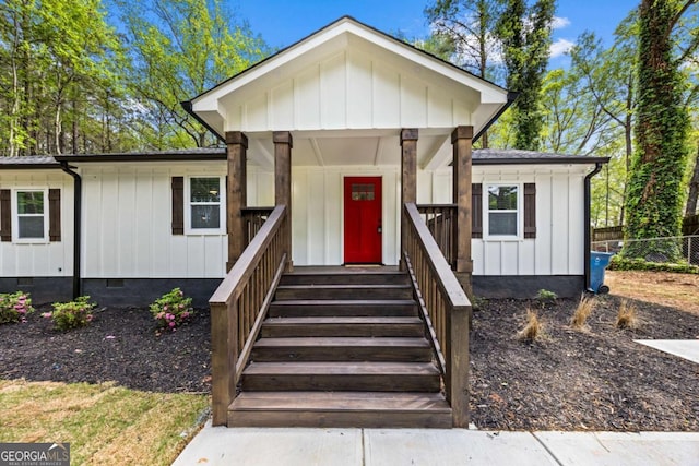 2798 Hutchins Rd, Lawrenceville, GA 30044 - view of front of property with crawl space and board and batten siding