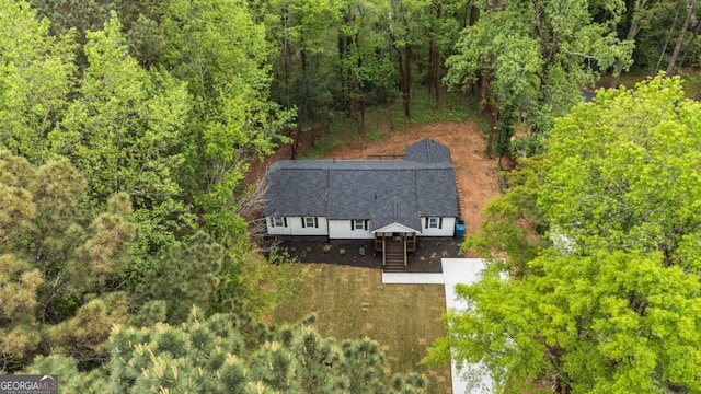 2798 Hutchins Rd, Lawrenceville, GA 30044 - aerial view of property and surrounding area featuring a heavily wooded area