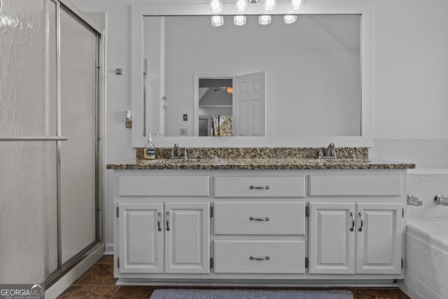 105 S Arcadia Dr, Bogart, GA 30622 - bathroom with double vanity, a stall shower, and a bathtub
