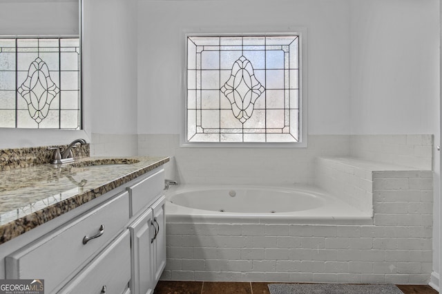 105 S Arcadia Dr, Bogart, GA 30622 - bathroom with a tub with jets and vanity