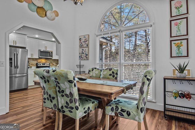 105 S Arcadia Dr, Bogart, GA 30622 - dining space with wood finished floors and baseboards