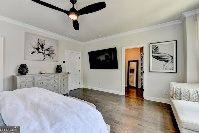 767 Farmstead Rd, Suwanee, GA 30024 - bedroom with ornamental molding, dark wood-style flooring, a spacious closet, and a ceiling fan