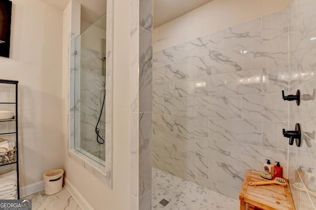 767 Farmstead Rd, Suwanee, GA 30024 - bathroom with a walk in shower and marble look tiles