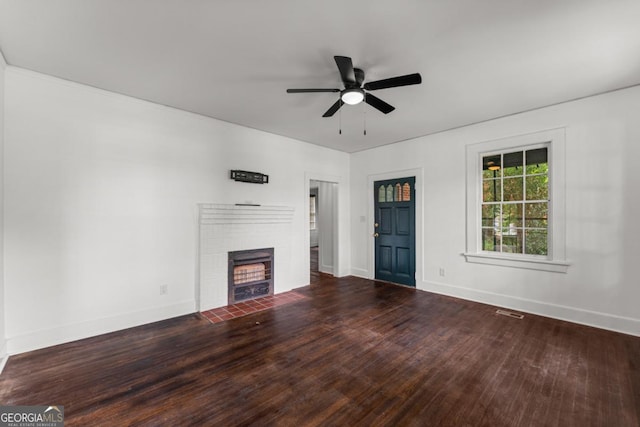 3105 Woodlawn Ave, Columbus, GA 31904 - unfurnished living room featuring a fireplace, ceiling fan, and wood finished floors