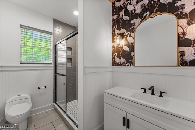 3105 Woodlawn Ave, Columbus, GA 31904 - full bathroom with a wainscoted wall, vanity, a stall shower, and tile patterned flooring