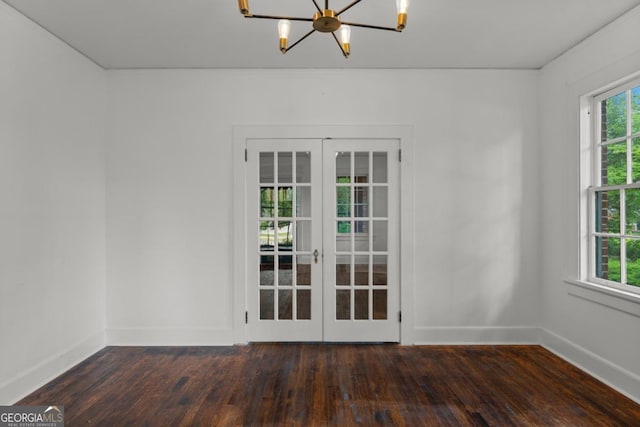 3105 Woodlawn Ave, Columbus, GA 31904 - unfurnished room with a chandelier, french doors, and dark wood finished floors