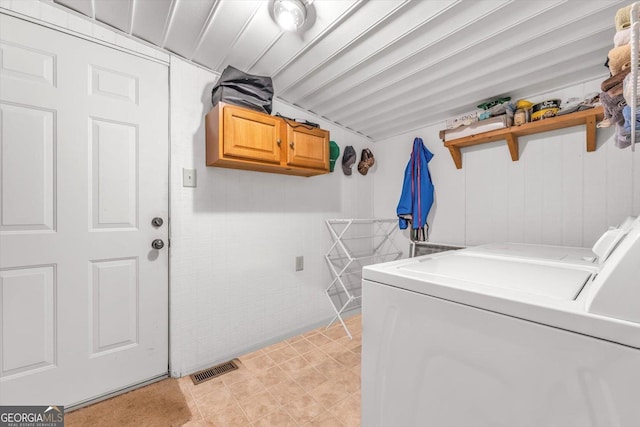 446 Thornton Rd, Washington, GA 30673 - washroom with washing machine and dryer and cabinet space
