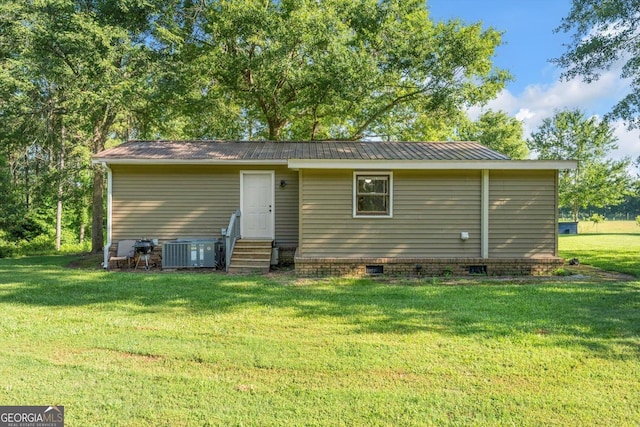 446 Thornton Rd, Washington, GA 30673 - back of property featuring entry steps, crawl space, a yard, and a metal roof