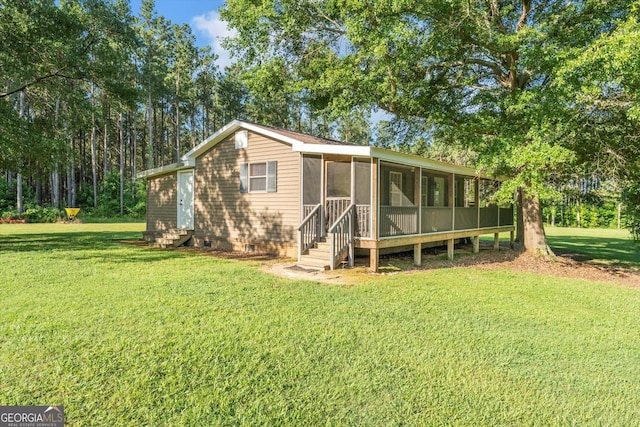 446 Thornton Rd, Washington, GA 30673 - view of front of home featuring entry steps, crawl space, a sunroom, and a front lawn