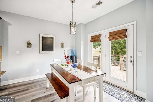 2755 Evan Manor Ln, Cumming, GA 30041 - dining room with light wood finished floors