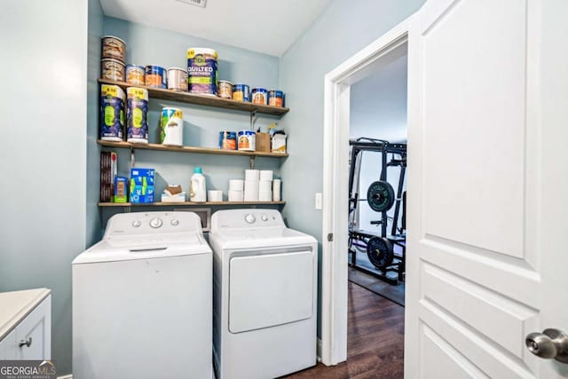 2755 Evan Manor Ln, Cumming, GA 30041 - washroom featuring washing machine and clothes dryer and dark wood-type flooring