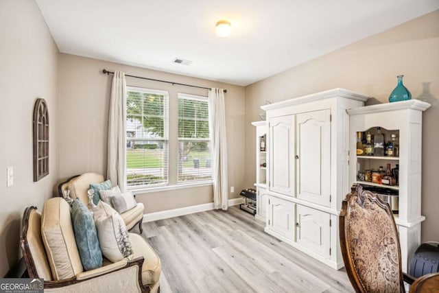2755 Evan Manor Ln, Cumming, GA 30041 - sitting room with light wood finished floors and baseboards