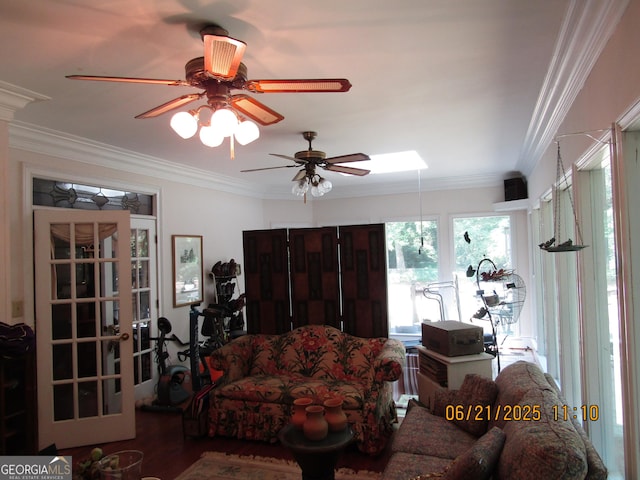 5523 Bahia Mar Cir, Stone Mountain, GA 30087 - living area featuring ornamental molding, a ceiling fan, wood finished floors, and a skylight