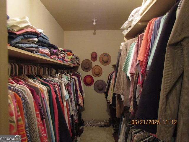 5523 Bahia Mar Cir, Stone Mountain, GA 30087 - walk in closet featuring carpet flooring