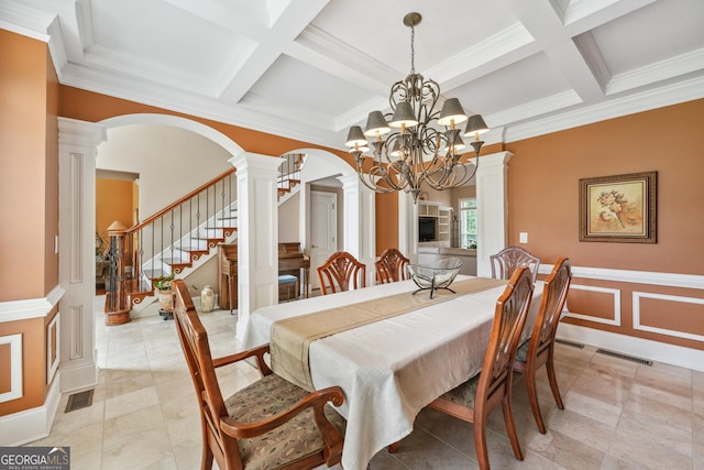 106 April Walk, Mcdonough, GA 30253 - dining room with decorative columns, arched walkways, coffered ceiling, a chandelier, and beamed ceiling