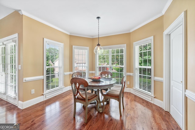 106 April Walk, Mcdonough, GA 30253 - dining space featuring wood finished floors and ornamental molding