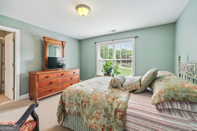 106 April Walk, Mcdonough, GA 30253 - bedroom with light colored carpet and baseboards