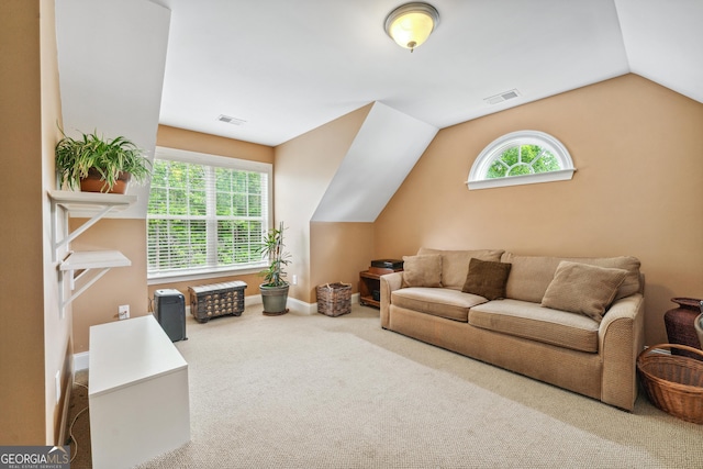 106 April Walk, Mcdonough, GA 30253 - carpeted living room with vaulted ceiling and baseboards