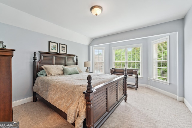 106 April Walk, Mcdonough, GA 30253 - bedroom with light carpet and vaulted ceiling