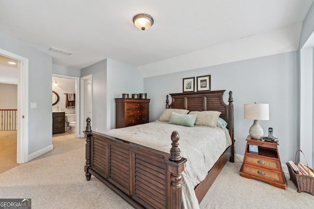 106 April Walk, Mcdonough, GA 30253 - bedroom with light colored carpet and ensuite bathroom
