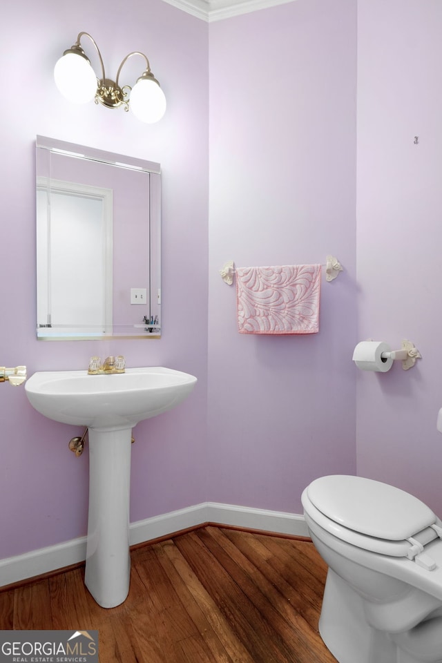 150 Tramore Trce, Tyrone, GA 30290 - bathroom featuring baseboards and wood finished floors